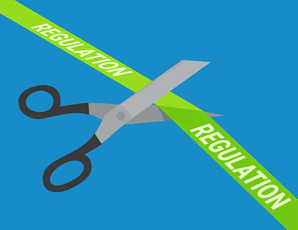scissors cutting through regulation tape